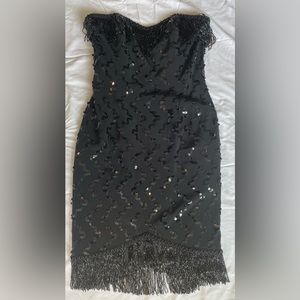 Strapless sequin dress with fringe detail.